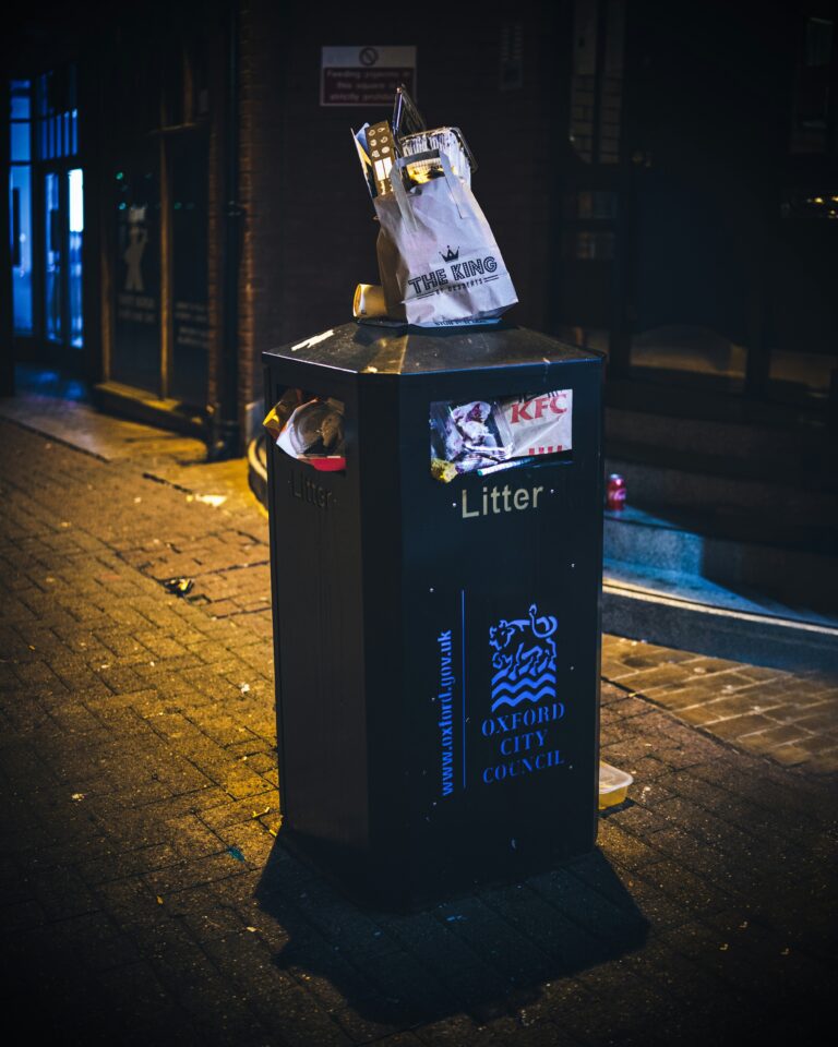 A full waste bin in Oxford, UK